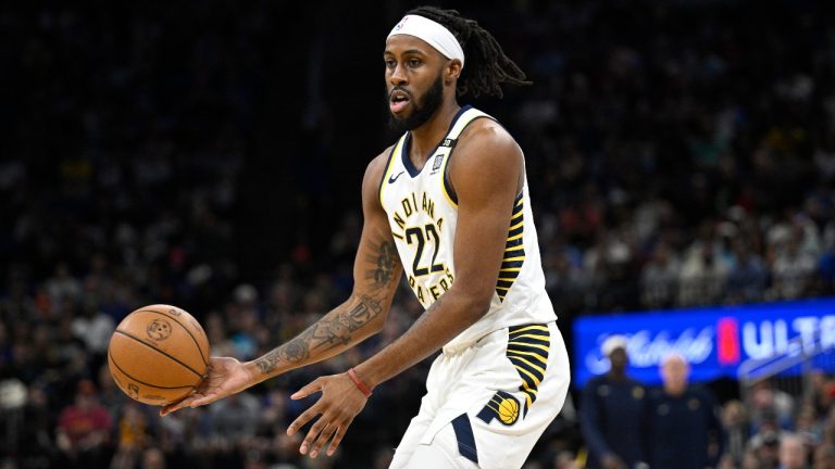 Indiana Pacers forward Isaiah Jackson (22) passes the ball during the first half of an NBA basketball game against the Orlando Magic, Sunday, March 10, 2024, in Orlando, Fla. (AP Photo/Phelan M. Ebenhack)