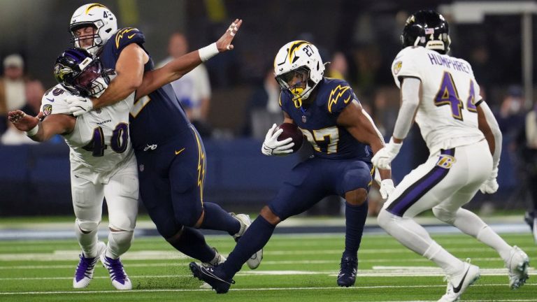 Los Angeles Chargers running back J.K. Dobbins carries during the first half of an NFL game against the Baltimore Ravens, Monday, Nov. 25, 2024, in Inglewood, Calif. (AP/Eric Thayer)