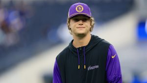 Minnesota Vikings quarterback JJ McCarthy stands before an NFL football game against the Los Angeles Rams Thursday, Oct. 24, 2024, in Inglewood, Calif. (AP Photo/Ryan Sun)