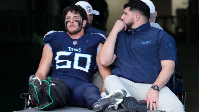 Tennessee Titans linebacker Jack Gibbens (50) is carted off the field after getting injured during the second half of an NFL football game against the Minnesota Vikings, Sunday, Nov. 17, 2024, in Nashville, Tenn. (George Walker IV/AP)