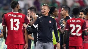 Canada head coach Jesse Marsch celebrates with his players following a match. (Tony Gutierrez/AP/CP)