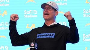 Los Angeles Chargers head coach Jim Harbaugh answers questions after a win over the Cincinnati Bengals in an NFL football game Sunday, Nov. 17, 2024, in Inglewood, Calif. (AP Photo/Gregory Bull)