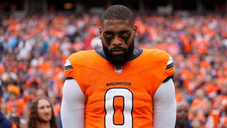 Denver Broncos linebacker Jonathon Cooper looks on before the start of an NFL football game against the Carolina Panthers Sunday, Oct. 27, 2024, in Denver. (AP Photo/Jack Dempsey)