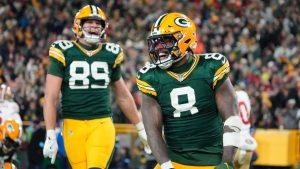 Green Bay Packers running back Josh Jacobs (8) celebrates a touchdown during the second half of an NFL game against the San Francisco 49ers on Sunday, Nov. 24, 2024 in Green Bay, Wis. (AP/Morry Gash)