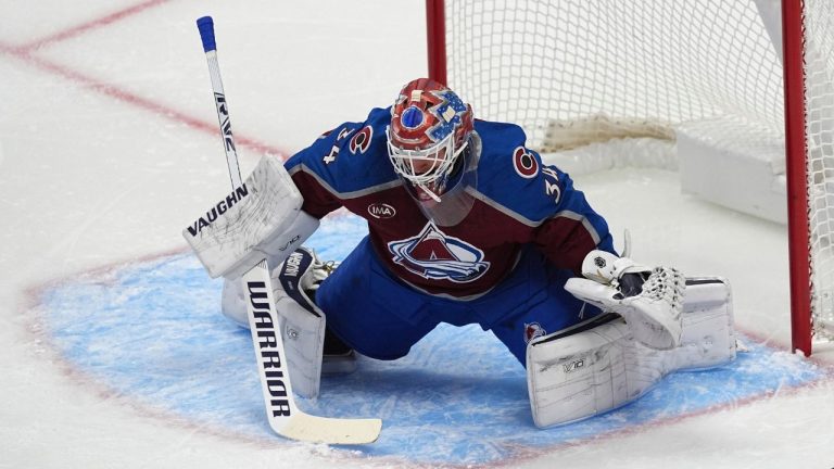 Colorado Avalanche goaltender Kaapo Kahkonen (34) stops a shot in the first period of an NHL hockey game against the Tampa Bay Lightning Wednesday, Oct. 30, 2024, in Denver. (David Zalubowski/AP Photo)