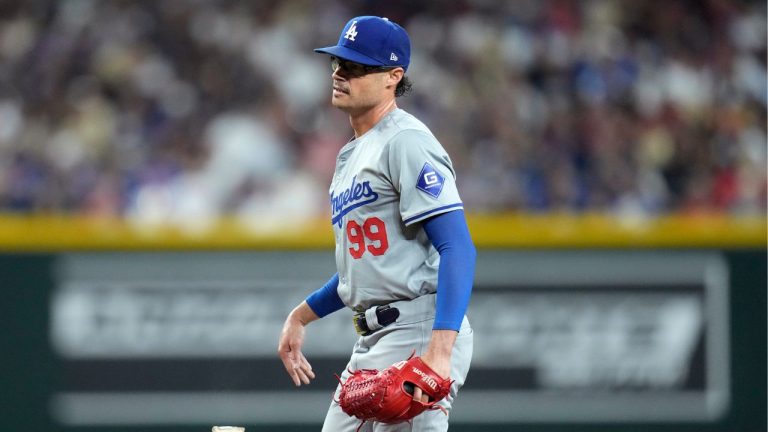 Los Angeles Dodgers pitcher Joe Kelly throws the rosin bag down during the third inning of a baseball game against the Arizona Diamondbacks Friday, Aug. 30, 2024, in Phoenix. (Ross D. Franklin/AP Photo)