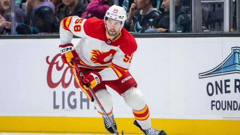 Calgary Flames forward Justin Kirkland skates with the puck during an NHL hockey game. (Stephen Brashear/AP)