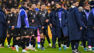 Kosovo players leave the pitch during the UEFA Nations League soccer match between Romania and Kosovo at the National Arena stadium in Bucharest, Romania, Saturday, Nov. 16, 2024. (Alexandru Dobre/AP)