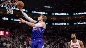 Utah Jazz forward Lauri Markkanen goes to the hoop ahead of New York Knicks centre Karl-Anthony Towns during the second half of an NBA game, Saturday, Nov. 23, 2024, in Salt Lake City. (AP/Spenser Heaps)