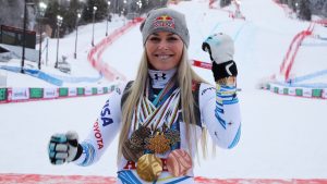 United States' Lindsey Vonn poses with her career's medals in the finish area after the women's downhill race, at the alpine ski World Championships in Are, Sweden, Sunday, Feb. 10, 2019. (Marco Trovati/AP)