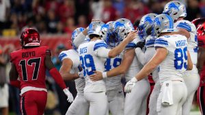 Detroit Lions place kicker Jake Bates (39) celebrates with teammates after kicking a 58-yard field goal during the second half of an NFL football game against the Houston Texans, Sunday, Nov. 10, 2024, in Houston. (