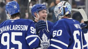 Toronto Maple Leafs' Fraser Minten (39) congratulates Toronto Maple Leafs' goaltender Joseph Woll after their team's 3-0 win over Vegas Golden Knights in NHL hockey action in Toronto, on Wednesday, November 20, 2024. (Chris Young/CP)