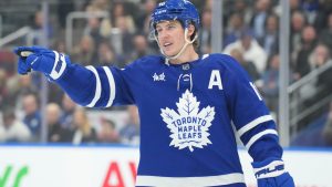 Toronto Maple Leafs' Mitch Marner talks to a teammate during NHL hockey action against the Ottawa Senators in Toronto, on Tuesday, November 12, 2024. (Chris Young/CP)