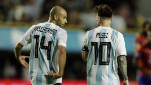 Former Argentina player Javier Mascherano, left, and Lionel Messi talk after Messi scored during a friendly soccer match between Argentina and Haiti in Buenos Aires, Argentina, Tuesday, May 29, 2018. (Victor R. Caivano/AP)