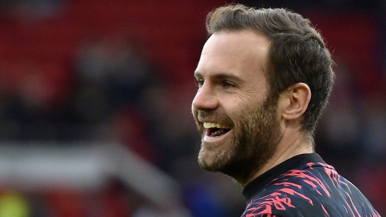 Manchester United's Juan Mata smiles during the warm up before the English Premier League soccer match between Manchester United and Tottenham Hotspur, at the Old Trafford stadium in Manchester, England, March 12, 2022. (Rui Vieira/AP)