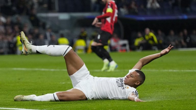 Real Madrid's Kylian Mbappe reacts during the Champions League opening phase soccer match against AC Milan at the Santiago Bernabeu stadium in Madrid, Spain, Tuesday, Nov. 5, 2024. (Manu Fernandez/AP Photo)
