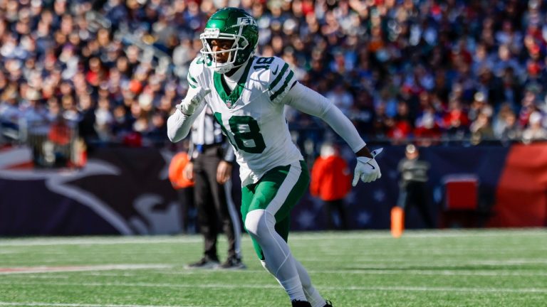 New York Jets wide receiver Mike Williams (18) runs a route during the first half of an NFL football game against the New England Patriots. (Greg M. Cooper/AP)