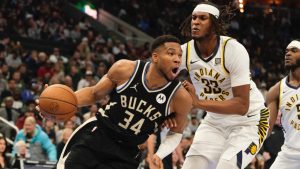 Milwaukee Bucks' Giannis Antetokounmpo tries to get past Indiana Pacers' Myles Turner during the first half of an Emirates NBA cup tournament basketball game Friday, Nov. 22, 2024, in Milwaukee. (Morry Gash/AP)