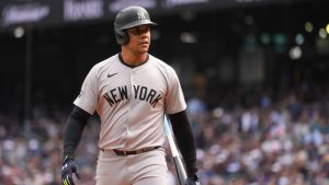 New York Yankees' Juan Soto walks back to the dugout after striking out against the Seattle Mariners during the first inning of a baseball game Thursday, Sept. 19, 2024, in Seattle. (Lindsey Wasson/AP)