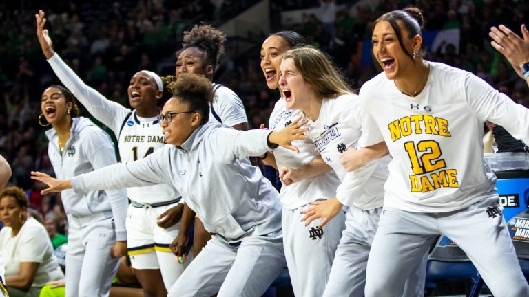 Notre Dame players celebrate on the bench during the second half of a second-round college basketball game against Mississippi in the NCAA Tournament, Monday, March 25, 2024, in South Bend, Ind. (AP Photo/Michael Caterina)