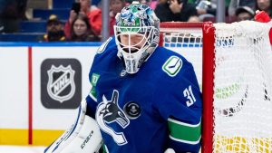 Vancouver Canucks goaltender Arturs Silovs (31) makes a save during third period NHL pre-season hockey action against the Edmonton Oilers in Vancouver, on Friday, October 4, 2024. (Ethan Cairns/CP Photo)