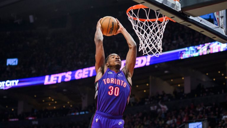 Toronto Raptors guard Ochai Agbaji (30) dunks during first half NBA action against the Sacramento Kings, in Toronto on Saturday, November 2, 2024. (Christopher Katsarov/CP Photo)