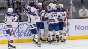 Edmonton Oilers centre Ryan Nugent-Hopkins celebrates the goal with his teammates against the Utah Hockey Club during overtime of an NHL hockey game, Friday, Nov. 29, 2024, in Salt Lake City. (Melissa Majchrzak/AP)