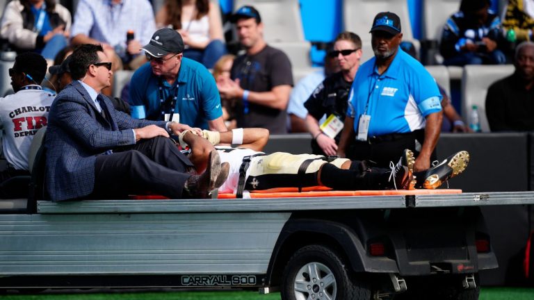 New Orleans Saints wide receiver Chris Olave is taken off the field after getting hurt during the first half of an NFL football game against the Carolina Panthers Sunday, Nov. 3, 2024, in Charlotte, N.C. (Jacob Kupferman/AP Photo)