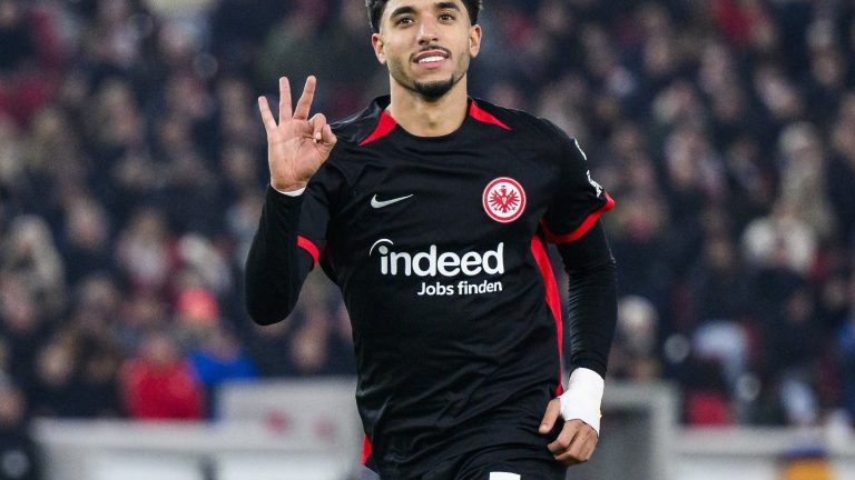 Frankfurt's Omar Marmoush celebrates after scoring his side's third goal of the game during the Bundesliga soccer match between VfB Stuttgart - Eintracht Frankfurt, at the MHPArena in Stuttgart, Germany, Sunday Nov. 10, 2024. (Tom Weller/dpa via AP)