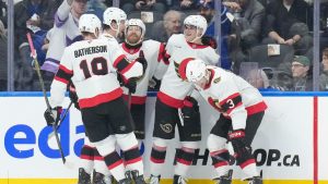 Ottawa Senators' Tim Stutzle (second right) celebrates with teammates after scoring against the Toronto Maple Leafs during second period NHL hockey action in Toronto, on Tuesday, November 12, 2024. (Chris Young/CP)