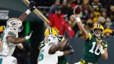 Love connects with Reed on two TDs as Packers use fast start to beat Dolphins