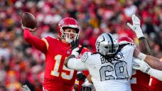 Chiefs recover botched snap by Raiders in final seconds to clinch playoff berth