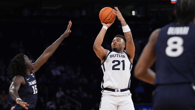 Butler's Pierre Brooks shoots over Xavier's Kachi Nzeh during the first half of an NCAA college basketball game in the first round of the Big East Conference tournament, Wednesday, March 13, 2024, in New York. (AP)