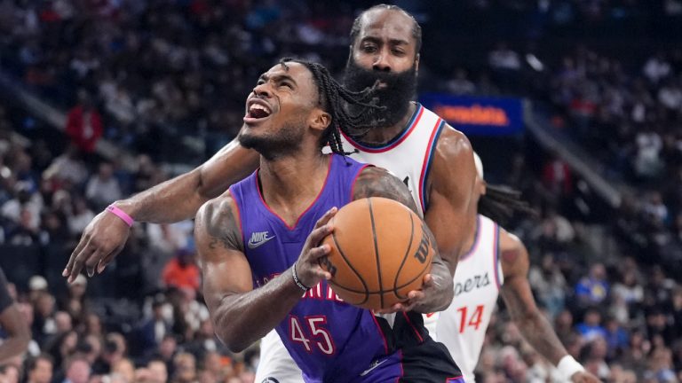 Toronto Raptors guard Davion Mitchell (45) drives past Los Angeles Clippers guard James Harden during the second half of an NBA basketball game Saturday, Nov. 9, 2024, in Inglewood, Calif. (Marcio Jose Sanchez/AP)