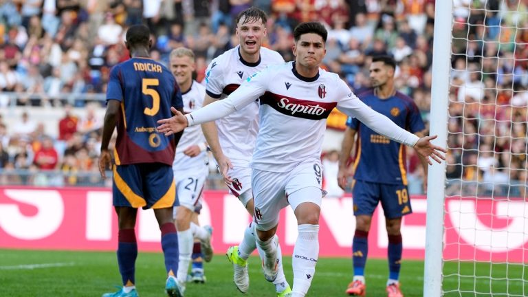 Bologna's Santiago Castro celebrates after scoring during the Serie A soccer match between Roma and Bologna at Rome's Olympic Stadium, Sunday, Nov. 10, 2024. (Alfredo Falcone/LaPresse via AP)