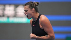 Aryna Sabalenka of Belarus reacts during the women's singles quarterfinals match against Karolina Muchova of the Czech Republic in the China Open tennis tournament, at the National Tennis Center in Beijing, Friday, Oct. 4, 2024. (Achmad Ibrahim/AP Photo)