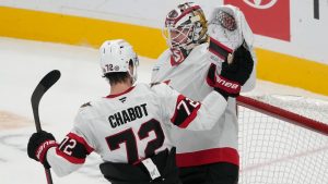 Ottawa Senators defenceman Thomas Chabot (72) celebrates with goaltender Linus Ullmark after the Senators defeated the San Jose Sharks in an NHL hockey game in San Jose, Calif., Wednesday, Nov. 27, 2024. (Jeff Chiu/AP)