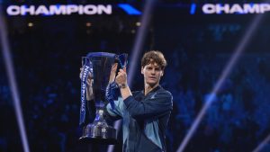 Italy's Jannik Sinner holds the trophy after winning the final match of the ATP World Tour Finals against Taylor Fritz of the United States at the Inalpi Arena, in Turin, Italy, Sunday, Nov. 17, 2024. (AP/Antonio Calanni)