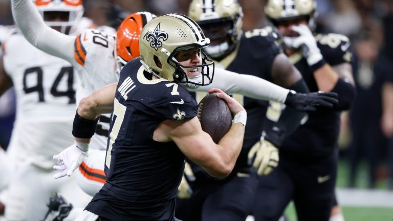 New Orleans Saints tight end Taysom Hill (7) carries for a touchdown in the second half of an NFL football game. (Butch Dill/AP)