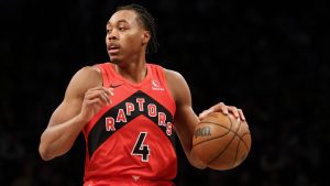 Toronto Raptors' Scottie Barnes dribbles in the first half during a preseason NBA basketball game. (Heather Khalifa/AP)