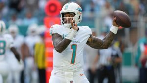 Miami Dolphins quarterback Tua Tagovailoa (1) aims a pass during the first half of an NFL football game against the New England Patriots, Sunday, Nov. 24, 2024, in Miami Gardens, Fla. (Lynne Sladky/AP)