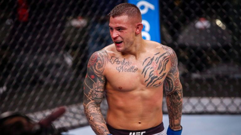 UFC lightweight fighter Dustin Poirier reacts after defeating UFC lightweight fighter Eddie Alvarez during UFC Fight Night in Calgary, Alta., Saturday, July 28, 2018. (Jeff McIntosh/CP Photo)