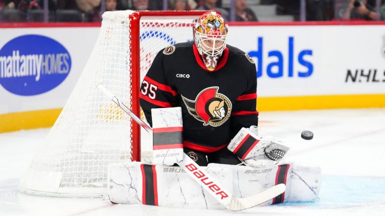 Ottawa Senators goaltender Linus Ullmark (35) keeps his eye on the puck as he makes a save against the St. Louis Blues in NHL hockey action in Ottawa on Tuesday, Oct. 29, 2024. (Sean Kilpatrick/CP Photo)