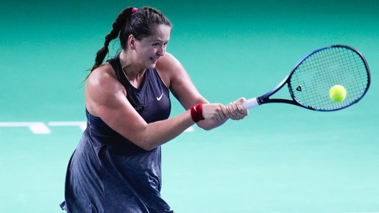 Slovakia's Viktoria Hruncakova competes against Great Britain's Emma Raducanu during a Billie Jean King Cup semi-final match at Martin Carpena Sports Hall in Malaga, southern Spain, on Tuesday, Nov. 19, 2024. (AP/Manu Fernandez)