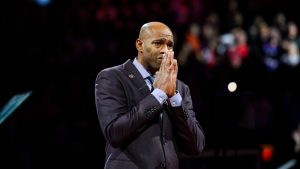 Former Toronto Raptors player Vince Carter reacts during his number retirement ceremony at halftime of an NBA basketball game between the Toronto Raptors and the Sacramento Kings in Toronto on Saturday, November 2, 2024. (Christopher Katsarov/CP)