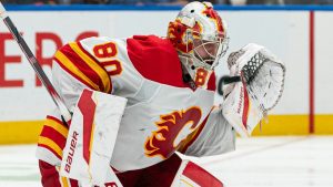 Calgary Flames goalie Dan Vladar makes a save against the Vancouver Canucks during third period NHL hockey action in Vancouver, B.C., Tuesday, November 12, 2024. (Rich Lam/CP)