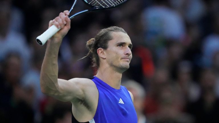 Germany's Alexander Zverev waves to the public after defeating Greece's Stefanos Tsitsipas during their quarterfinal match of the Paris Masters tennis tournament at the Accor Arena, Friday, Nov. 1, 2024 in Paris. (Michel Euler/AP Photo)