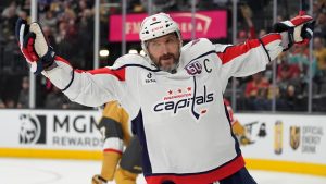 Washington Capitals left wing Alex Ovechkin (8) celebrates after scoring against the Vegas Golden Knights for a hat trick during the third period of an NHL hockey game Sunday, Nov. 17, 2024, in Las Vegas. (John Locher/AP)