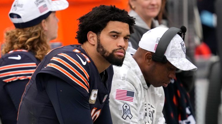 Chicago Bears quarterback Caleb Williams sits on the bench in the closing minutes of an NFL football game against the New England Patriots on Sunday, Nov. 10, 2024, in Chicago. (Nam Y. Huh/AP)