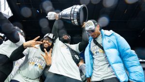 Toronto Argonauts players spray champagne during a Grey Cup championship rally in Toronto on Tuesday, Nov. 19, 2024. The Argonauts defeated the Winnipeg Blue Bombers on Sunday to win the cup. (Arlyn McAdorey/CP Photo)